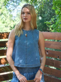 Cropped sleeveless denim pattern top, styled view