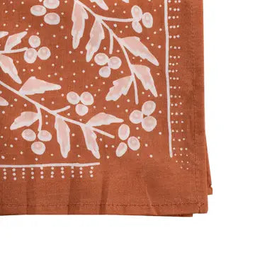 Terra copper and pink floral cotton bandana folded to show print detail