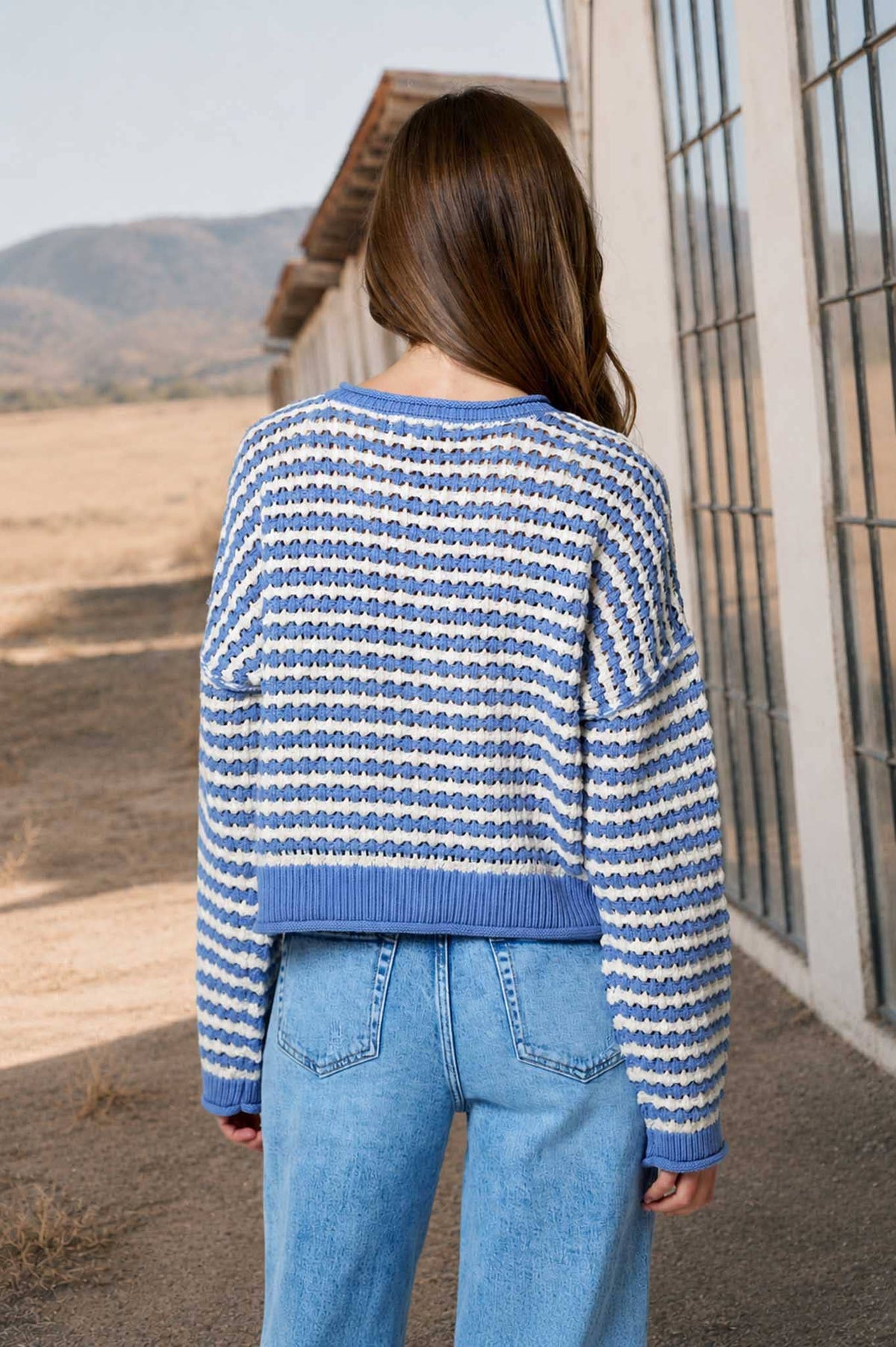 Close-up of open crochet knit texture on Bellamy cardigan