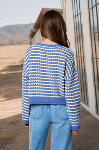Close-up of open crochet knit texture on Bellamy cardigan