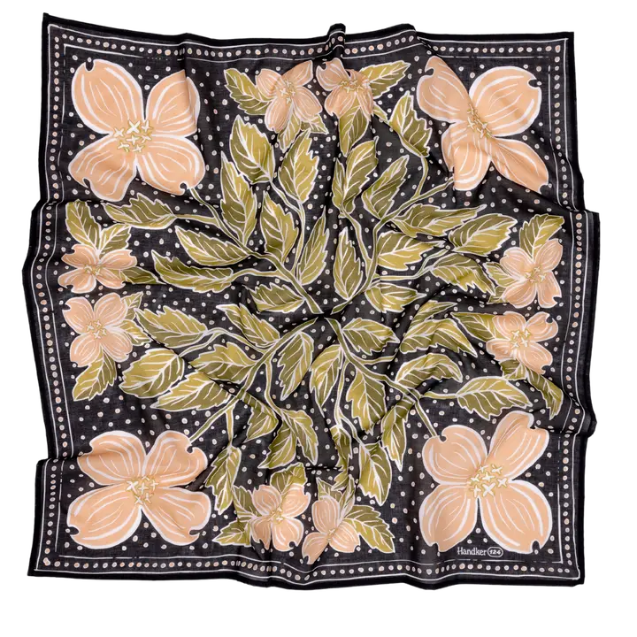 Close-up of the black and peach dogwood floral print on the Amy wild rag