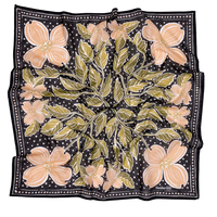 Close-up of the black and peach dogwood floral print on the Amy wild rag