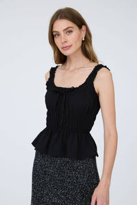 Back view of Alfie Shirred Waist Tank Top showing ruffle hem detail