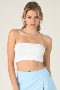 Bandeau top worn as a base layer under an open-front top