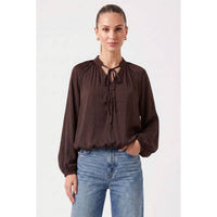 Naked Zebra - Billowy Tie Neck Long Sleeve Blouse: Wine / L, featuring a billowy, dark wine tie neck with a buttoned placket, worn with blue jeans.