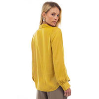 A mustard yellow, long-sleeved woven polyester Naked Zebra - Neck Shirt With Open Seam Sleeve: Black / L button-up shirt viewed from the back.
