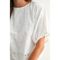 Embroidered white cotton blouse with relaxed fit, detail