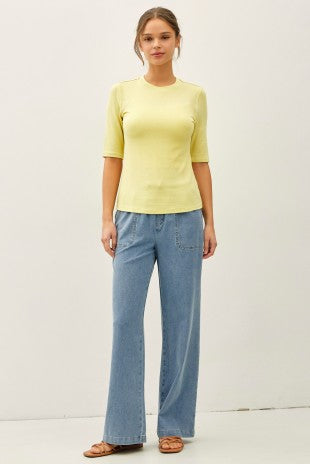 Medium wash knit denim wide leg pull-on pants on model