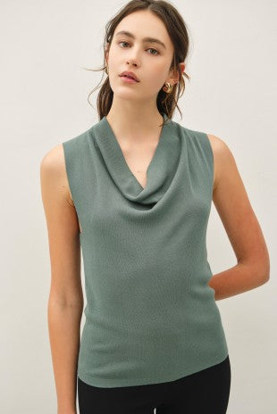 Woman wearing Linda green cowl neck sleeveless tank sweater in a fine knit
