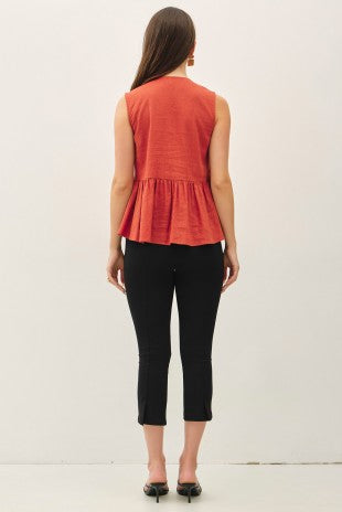 Airy terracotta viscose linen peplum top, side view