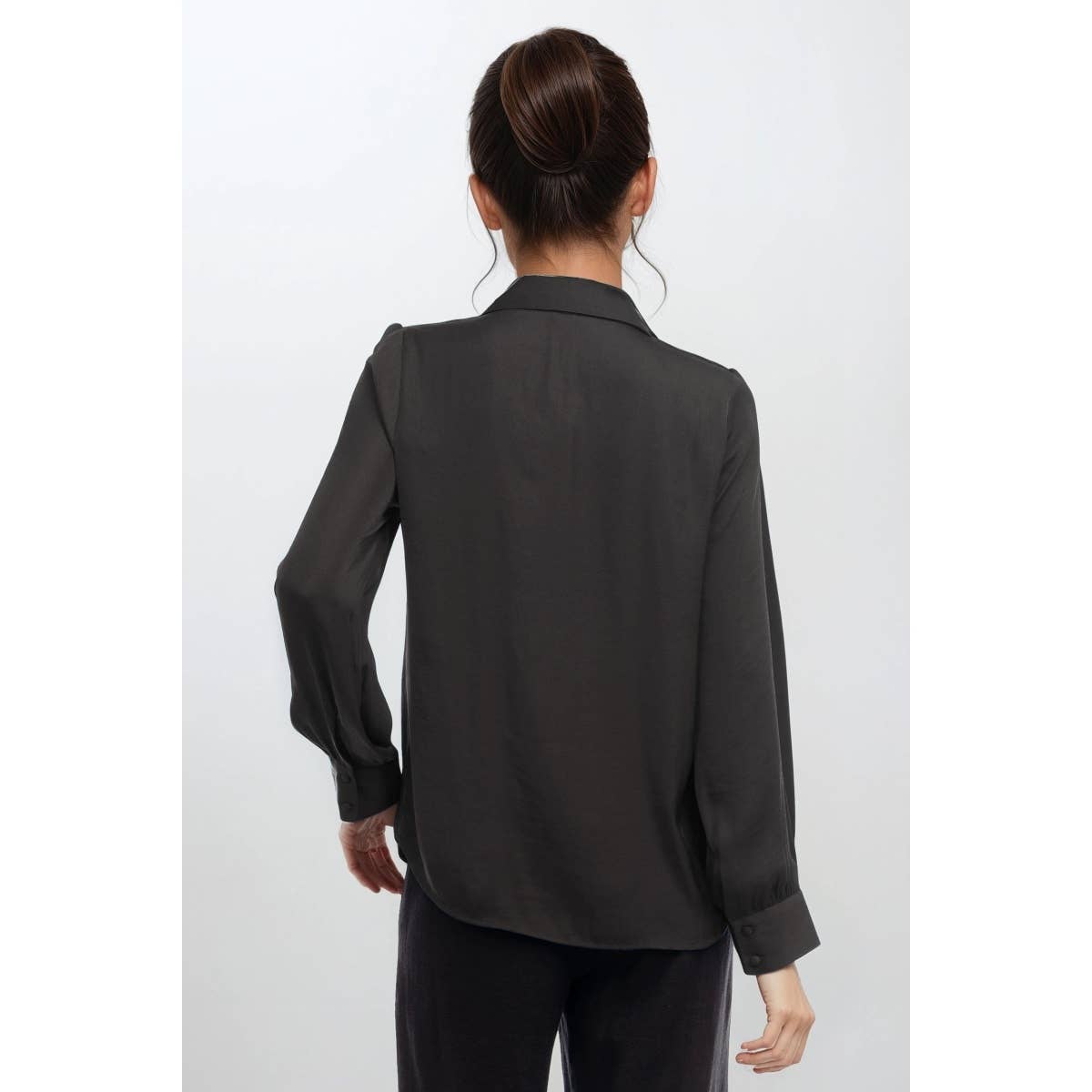 Back view of a black Naked Zebra - Neck Shirt With Open Seam Sleeve, a woven polyester long-sleeved button-down shirt with a collar and open seam cuffs.