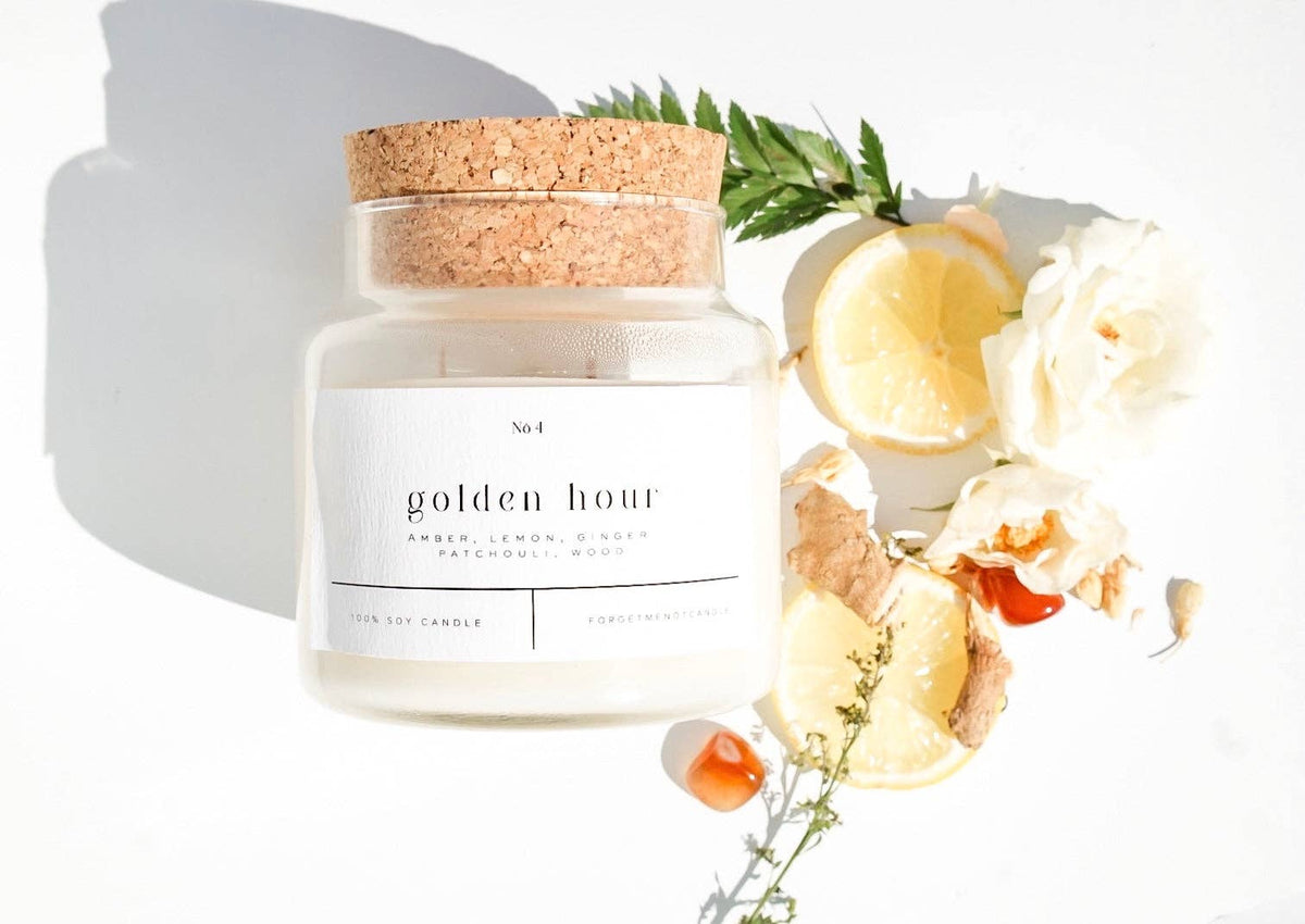 Forget Me Not Golden Hour 22 oz soy candle in glass apothecary jar with cork lid
