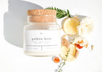 Forget Me Not Golden Hour 22 oz soy candle in glass apothecary jar with cork lid
