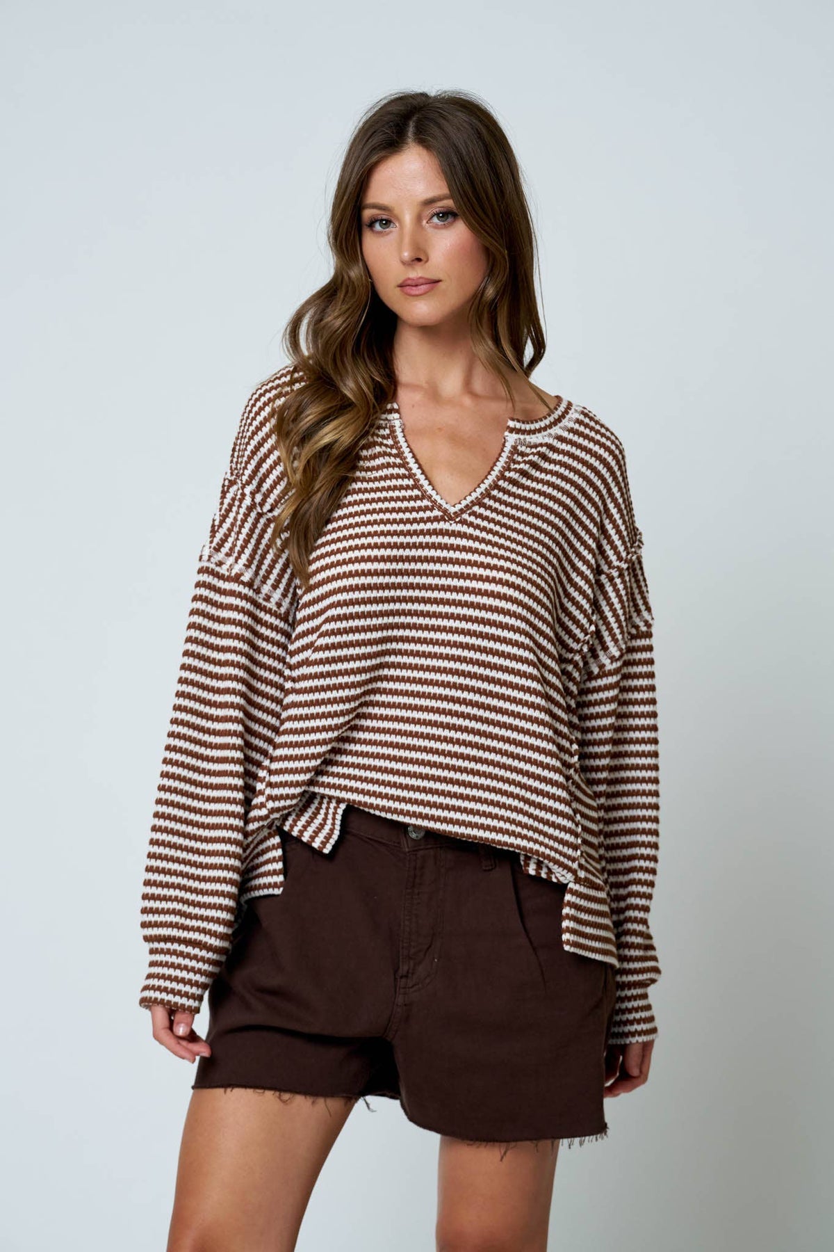 Side view of Lennon oversized stripe knit top