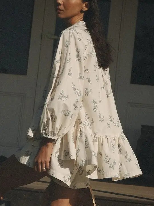 Rosa Ditsy Floral Peplum Blouse and Shorts Two-Piece Set in cream, side view showing peplum silhouette