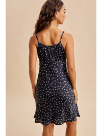 Ditzy floral print navy satin mini dress with neckline tie, full-length styled view