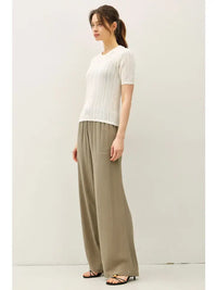 White short sleeve chevron knit sweater with ribbed cuffs and hem