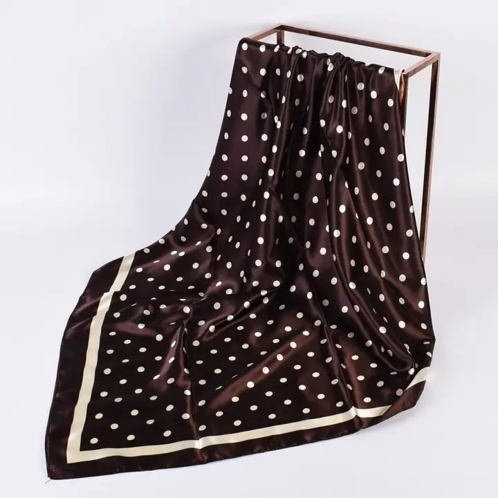 Brown polka dot bandana scarf styled as a neck scarf, 35 by 35 inch square