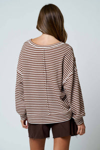 Close-up of exposed seam detail on Lennon stripe top