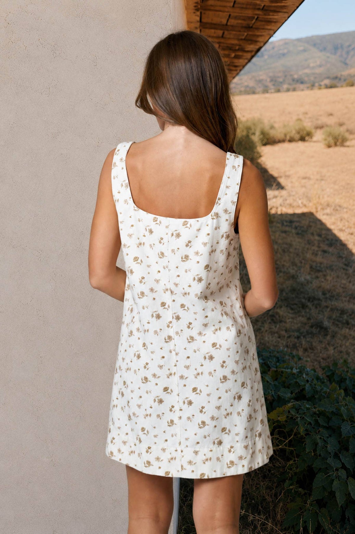 Spencer floral mini dress sleeveless silhouette, side view