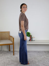 Back view of the Coffeegrl Coffee Tee in garment-dyed espresso brown cotton with visible back-pocket label