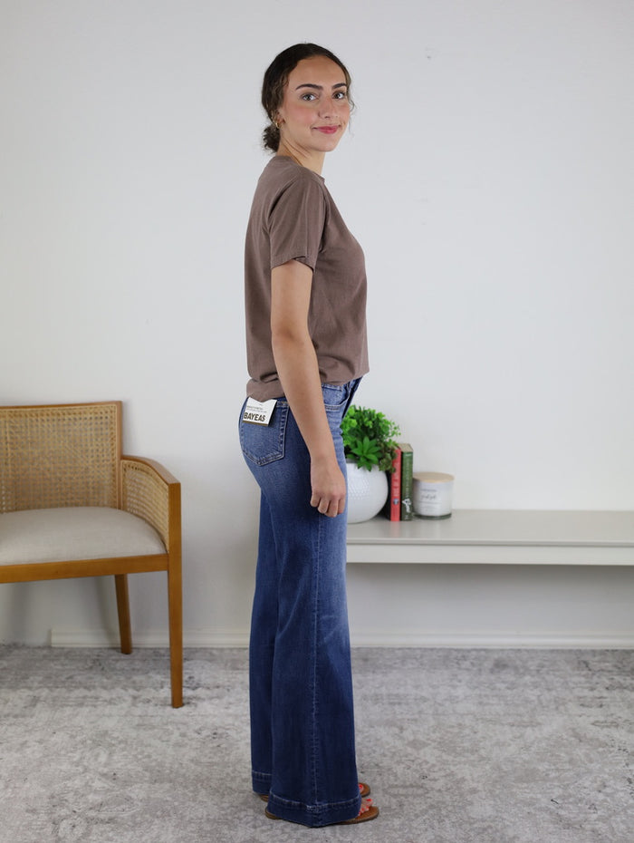 Back view of the Coffeegrl Coffee Tee in garment-dyed espresso brown cotton with visible back-pocket label