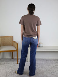 Coffeegrl Coffee Tee by Comfort Colors, unisex relaxed-fit graphic t-shirt styled with flared blue jeans