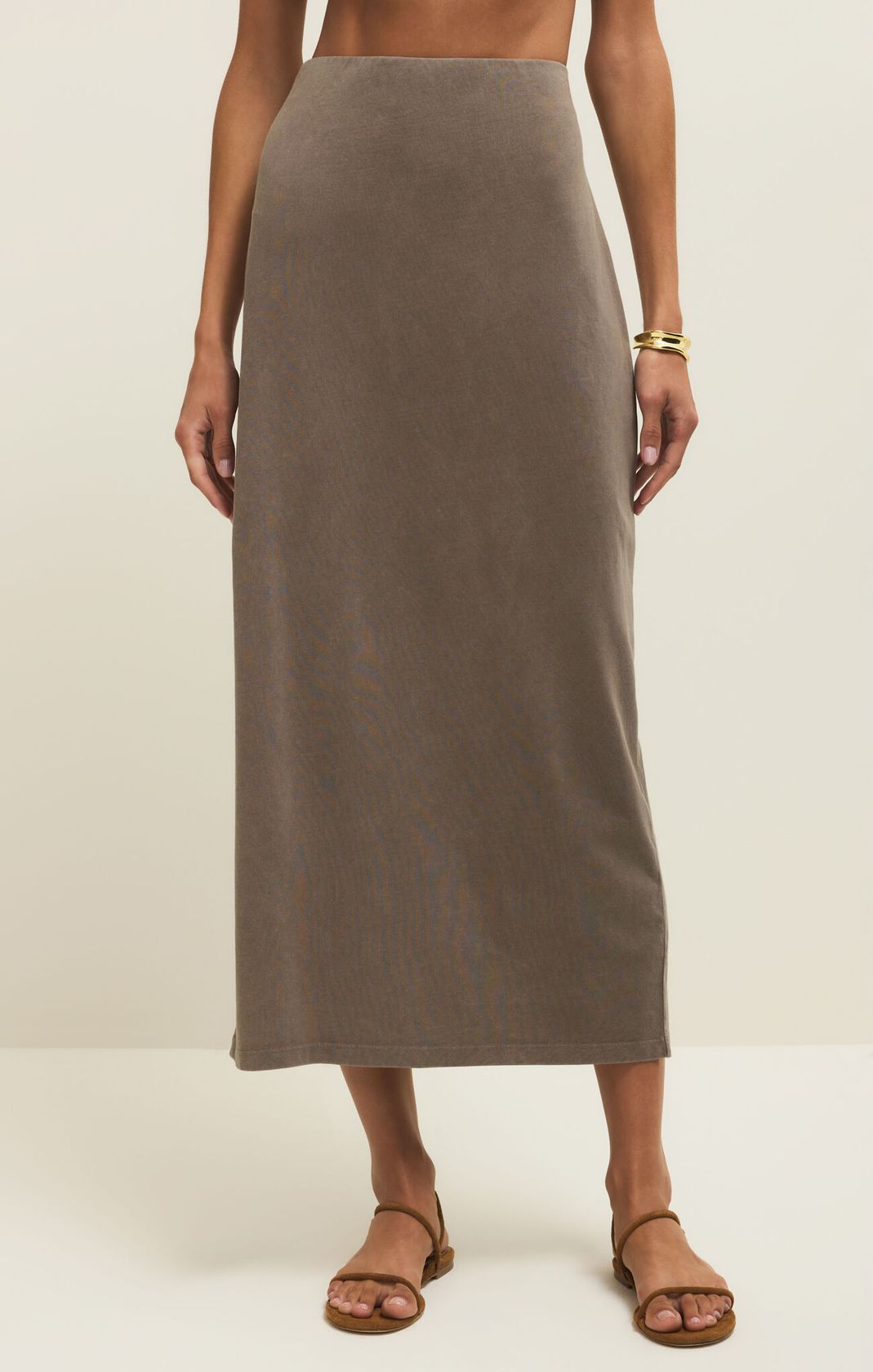 Woman wearing the Gail Midi Skirt in taupe cotton jersey, front view