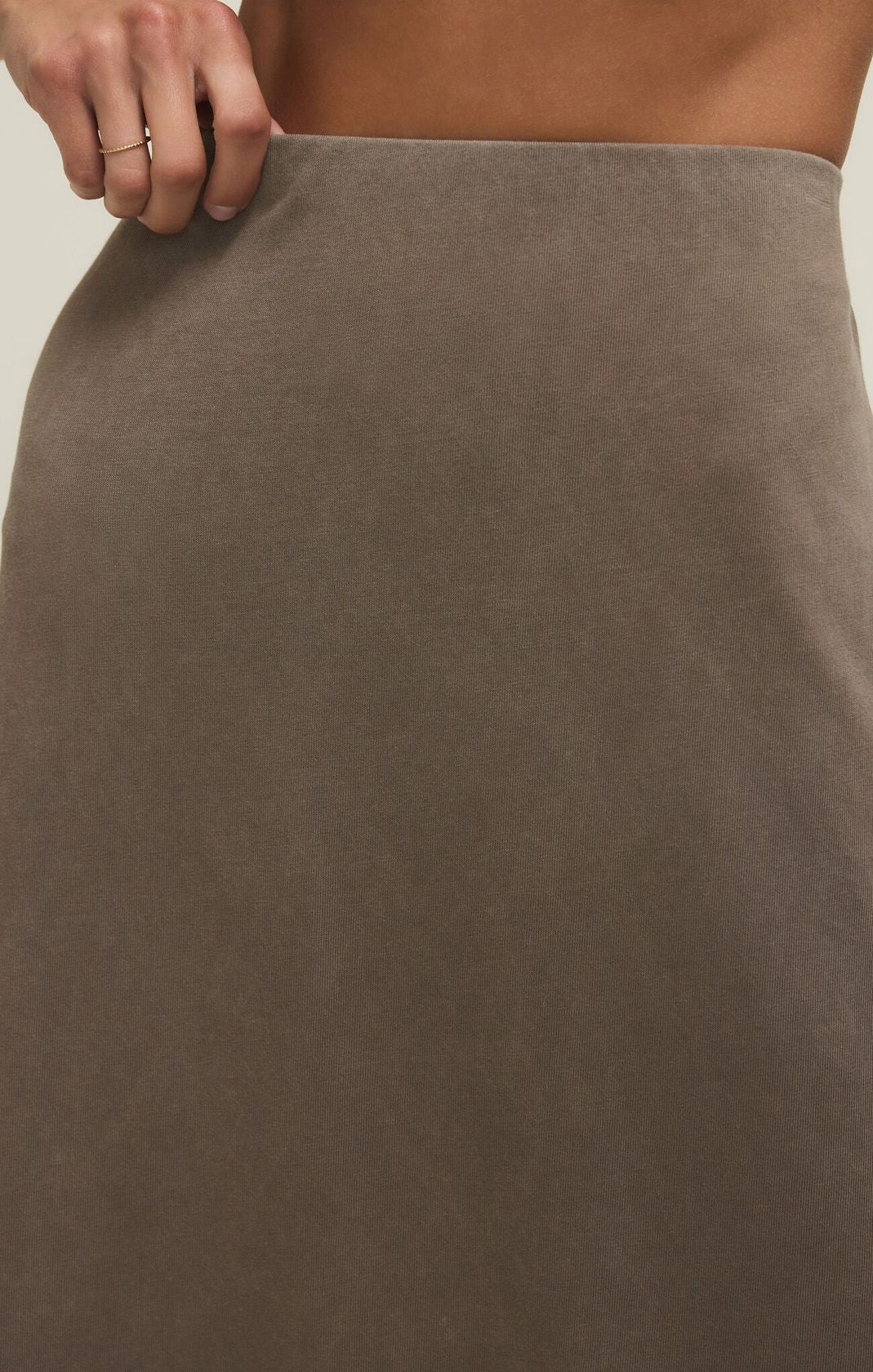 Close-up of taupe cotton jersey fabric on the ankle-length Gail Midi Skirt