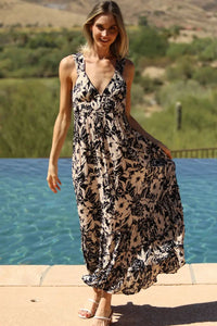 Black and ivory print V-neck maxi dress from Glitz Fine Clothing