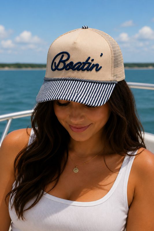 Boatin' vintage trucker hat in cream with navy embroidery and rope trim brim