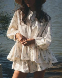 Rosa Ditsy Floral Peplum Blouse and Shorts Two-Piece Set in cream, front view
