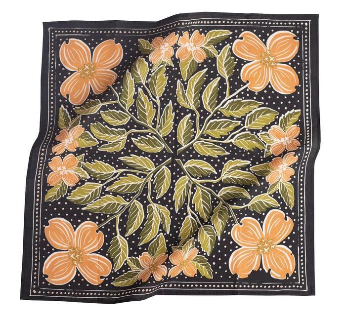 Introducing the No. 046 Amy Bandana—a square bandana featuring a black background adorned with vibrant orange flowers, green leaves, and delicate white dots. Crafted from soft cotton fabric with a slightly wrinkled texture, this versatile accessory adds a stylish flair to any outfit and can even be used as an adorable dog bandana for your furry companion.