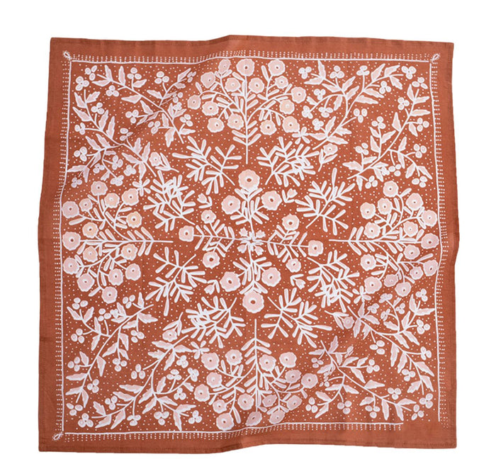 No. 058 Terra Bandana in copper cotton with light pink floral print, flat lay