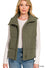 Wren Puffer Vest in dark olive high-neck quilted puffer