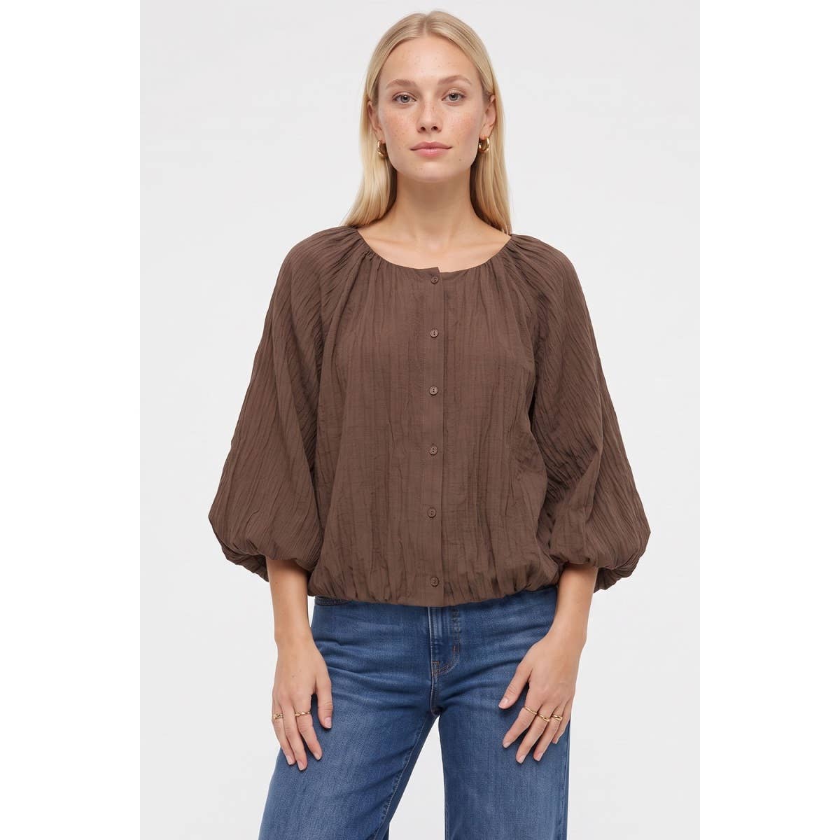 Naked Zebra - Crinkle Texture Bubble Hem Button Up Blouse in black, featuring a crinkle texture, gathered neckline, voluminous long sleeves, and a bubble hem.