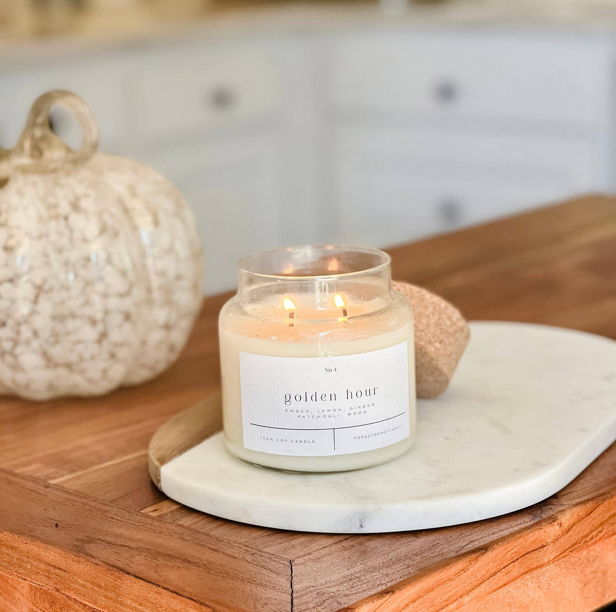 Forget Me Not Golden Hour candle with citrus, ginger and warm amber scent notes