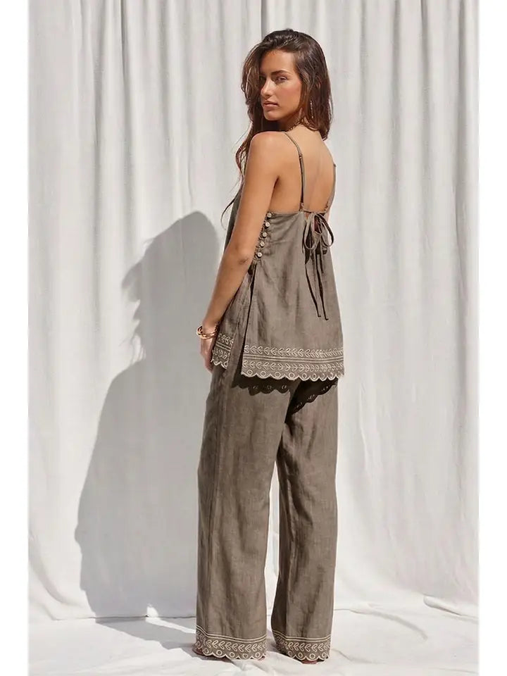 Embroidery detail on mocha two-piece pant set, close view