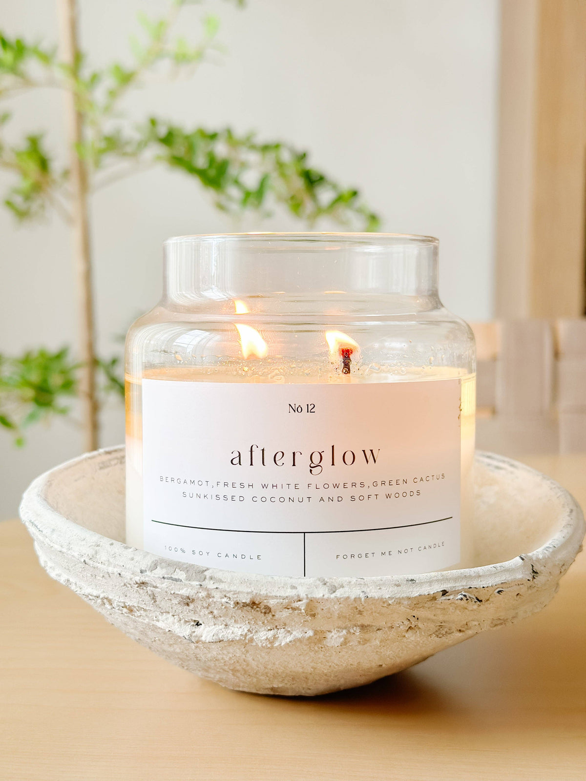 Forget Me Not Afterglow 22 oz soy candle in glass apothecary jar with cork lid
