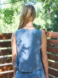 Seam detail denim top with back keyhole closure, back view