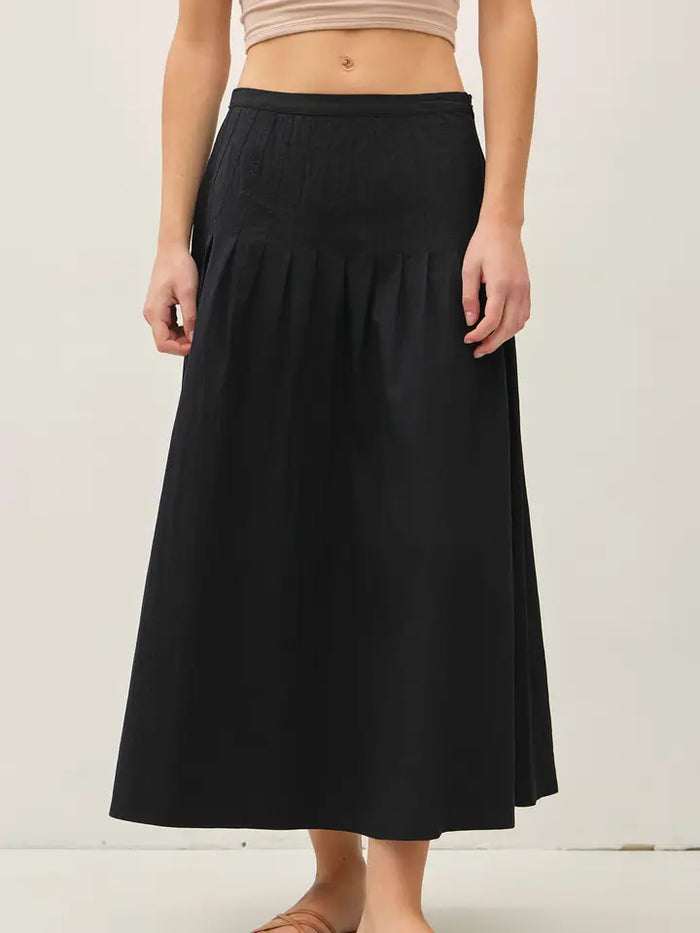 Walker Drop Waist Midi Skirt in black – women's pleated drop waist midi skirt | Glitz Fine Clothing
