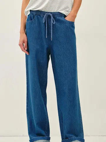 Medium wash wide leg pull-on denim look pants from Glitz Fine Clothing